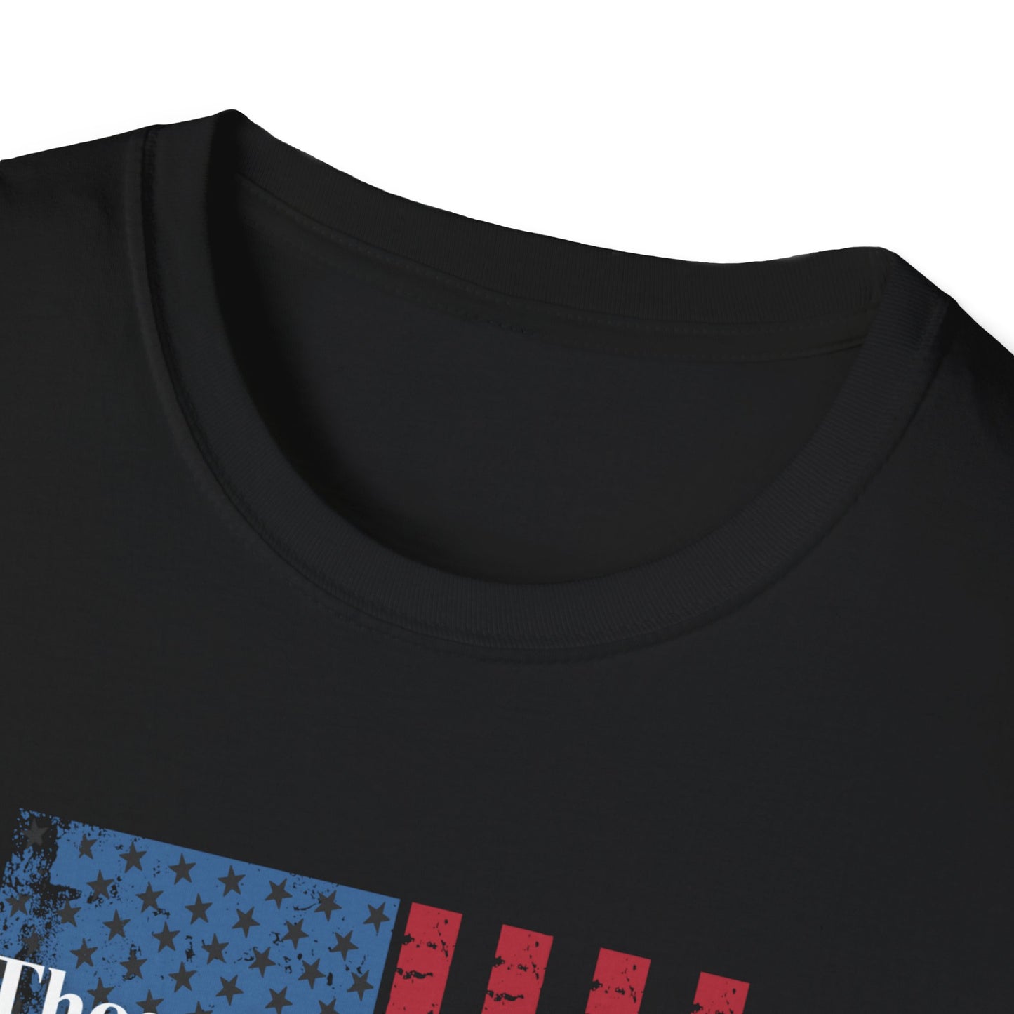 A close-up view of the neckline of a black T-shirt, showing the fine ribbed crew neck collar and upper portion of the shirt's graphic. The visible part of the design features a distressed blue rectangle with black stars and red vertical stripes, suggesting an American flag motif. The fabric appears smooth and well-stitched, indicating high-quality construction.