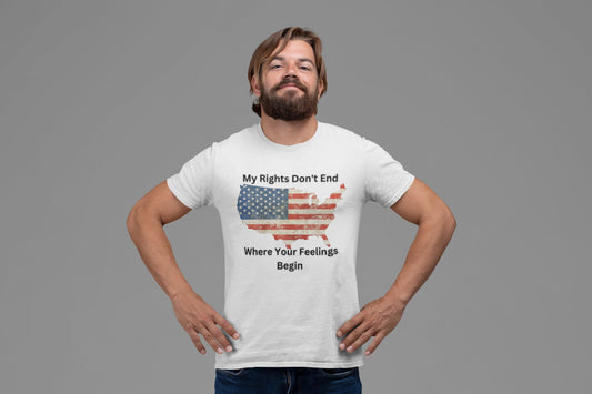 Patriotic unisex graphic t-shirt featuring a distressed American flag in the shape of the USA with the bold text "My Rights Don't End Where Your Feelings Begin" — ideal for freedom lovers, constitutional rights supporters, and American pride apparel. Shown on a confident bearded man in a studio setting.