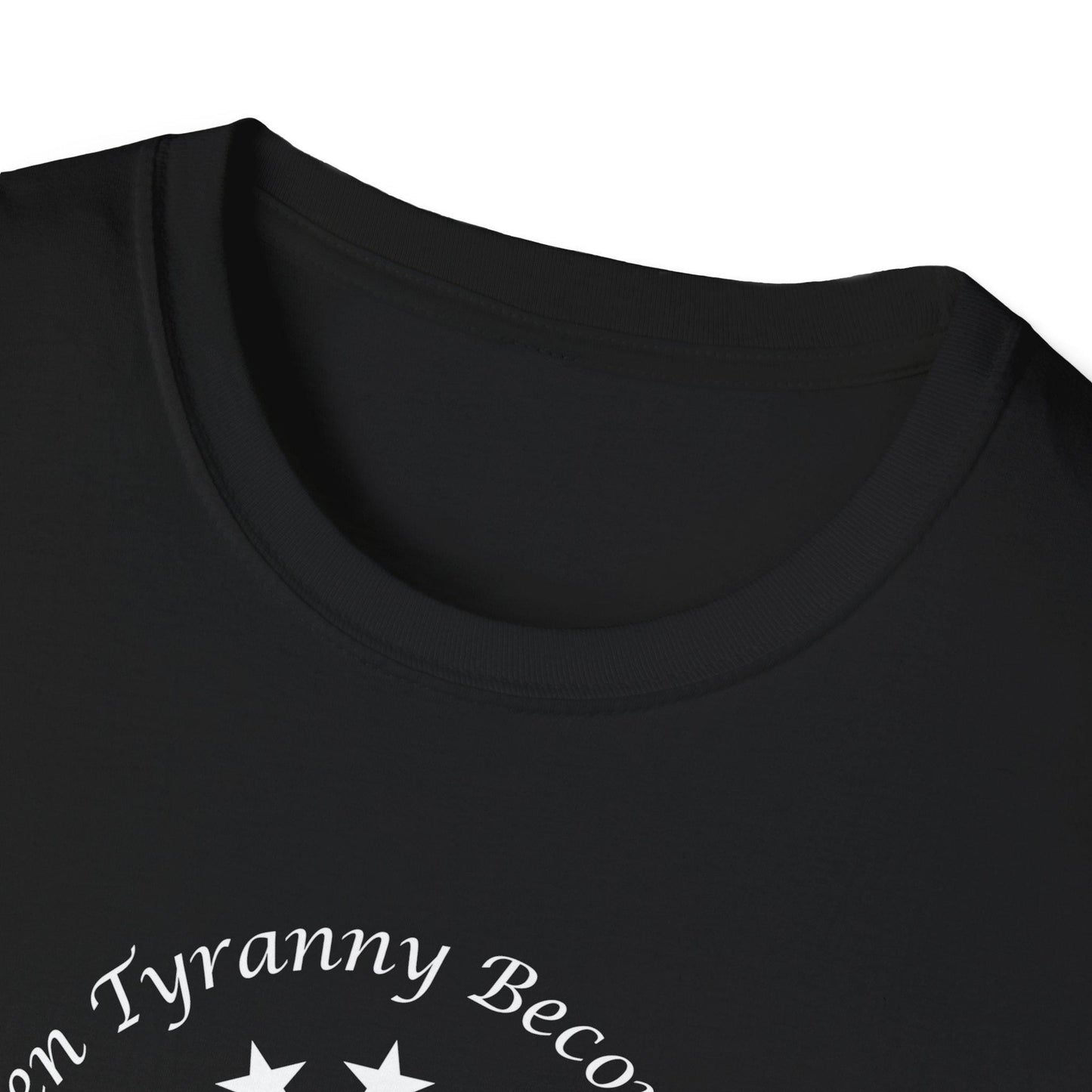 Close-up of black crewneck t-shirt collar showcasing durable stitching and partial view of patriotic graphic text reading “When Tyranny Becomes Law”—premium cotton tee ideal for bold, statement-making apparel.