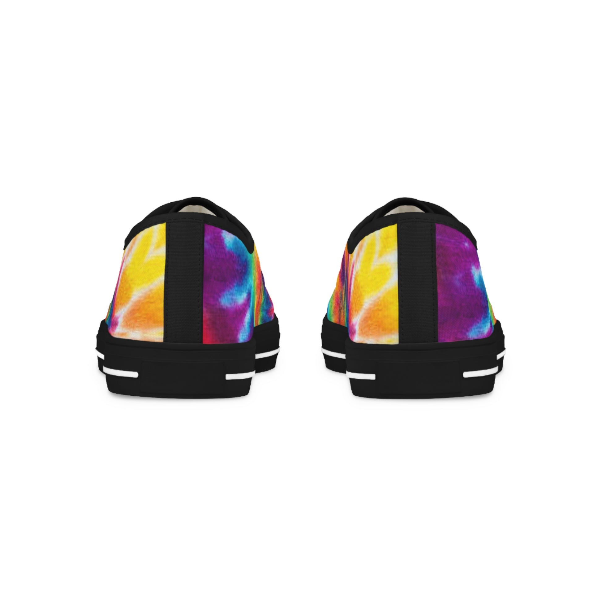 Pair of black slip-on shoes with colorful tie-dye pattern on a white background