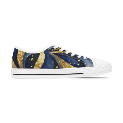 Navy and gold sneaker with white sole on a white background