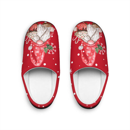 Red slippers with Santa gnome design on a white background
