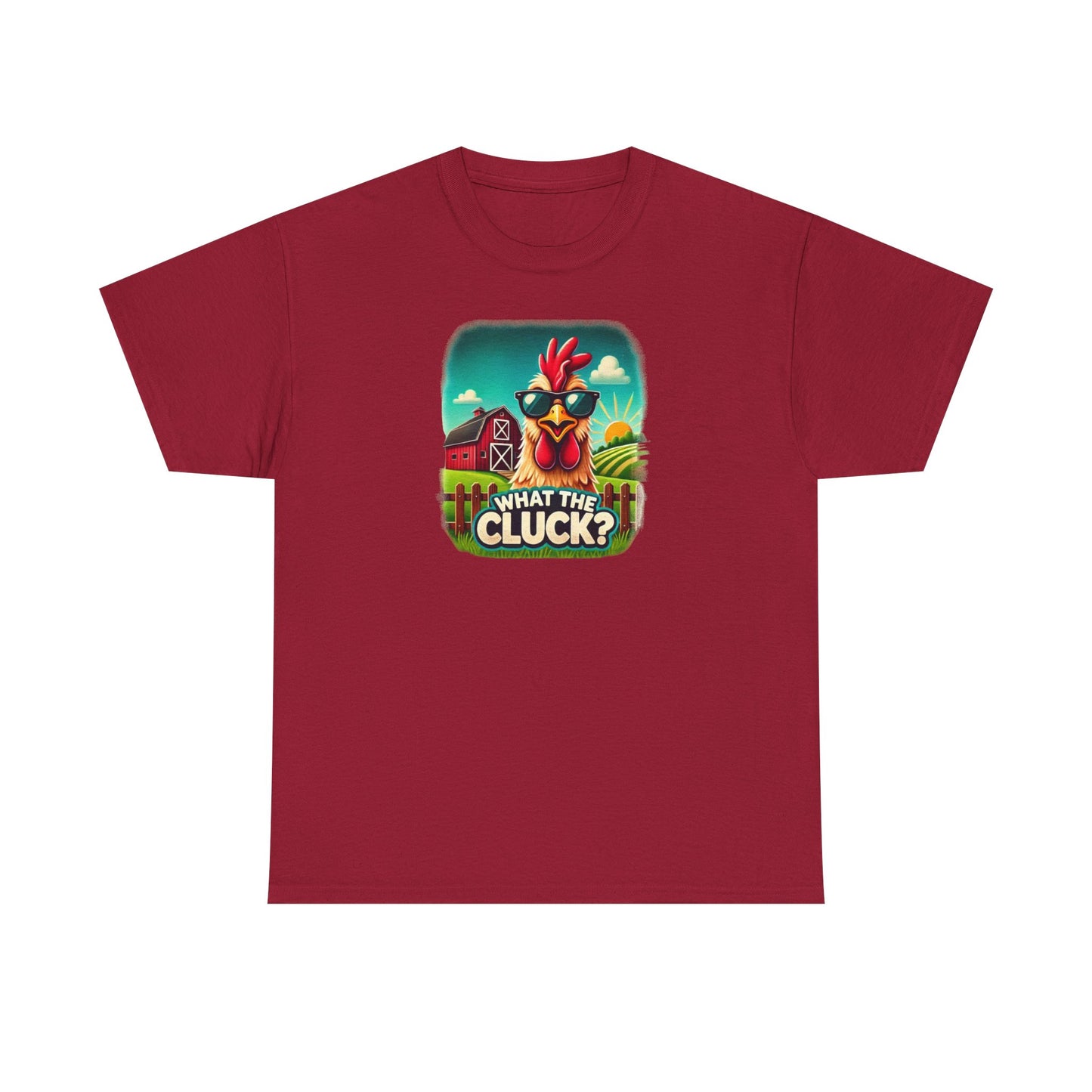 Red unisex t-shirt with a colorful cartoon graphic of a chicken wearing sunglasses, standing in front of a red barn and sunny farm scene, featuring the playful phrase "What the Cluck?" printed below.