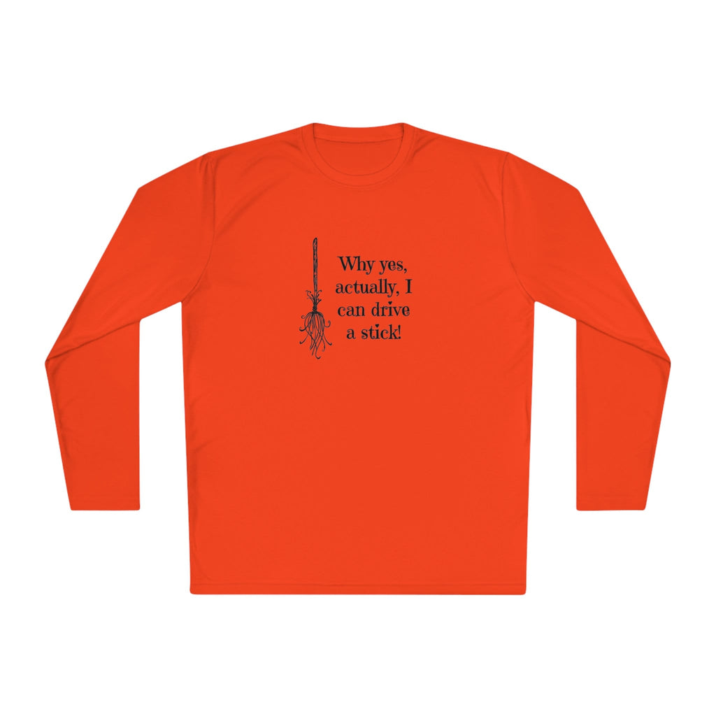 Flat lay of a orange long-sleeve Halloween shirt featuring a black graphic of a broomstick and the fun witch-themed quote &quot;Why yes, actually, I can drive a stick!&quot; — ideal for spooky season fashion, fall outfits, and Halloween party wear. Perfect novelty shirt for women who love witchy humor and festive October apparel.