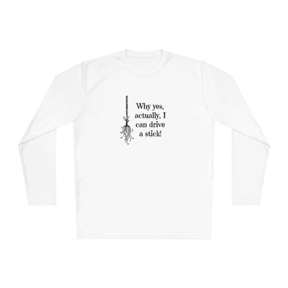 Flat lay of a white long-sleeve Halloween shirt featuring a black broomstick graphic and the humorous witch quote &quot;Why yes, actually, I can drive a stick!&quot; — perfect fall shirt for women, Halloween party outfit, or casual spooky season wear. Fun and festive witch-themed tee for October celebrations and autumn lovers.