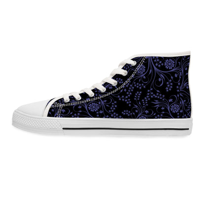 A single high-top sneaker is shown in a side view against a white background. The shoe features a black canvas upper decorated with a detailed purple floral and paisley pattern. It has white laces, a white rubber toe cap, and a white sole with a black stripe, giving it a bold and stylish contrast.