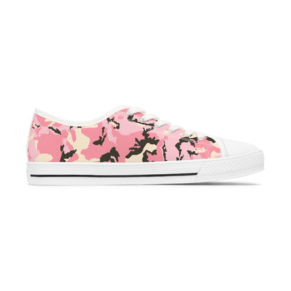 Inner side view of a pink camouflage low-top canvas sneaker with white laces and a white rubber sole featuring a black stripe—fashionable and functional shoe for everyday casual wear.