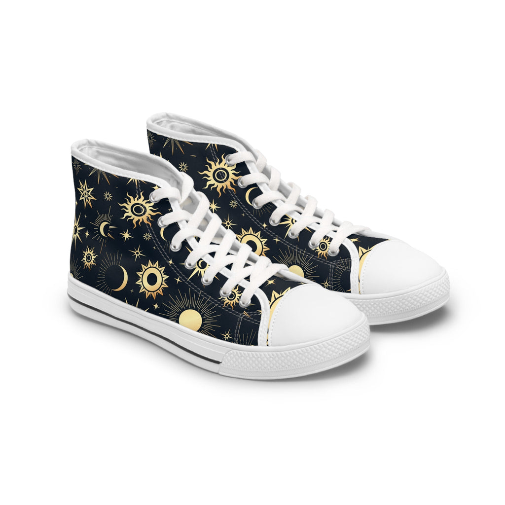 Angled view of a pair of high-top canvas sneakers featuring a celestial design on a dark navy background. The pattern includes golden suns, moons, and stars in various sizes and styles. The shoes have white laces, white rubber toe caps, and white soles with a black stripe detail, combining a cosmic aesthetic with classic sneaker styling.