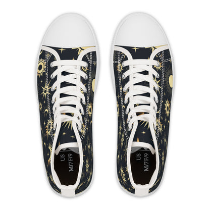 Top-down view of a pair of high-top sneakers with a celestial design featuring golden suns, moons, and stars on a dark navy background. The shoes have white laces, white rubber toe caps, and black insoles labeled with the size “US M7/F9.” The symmetrical pattern creates a visually striking cosmic aesthetic.