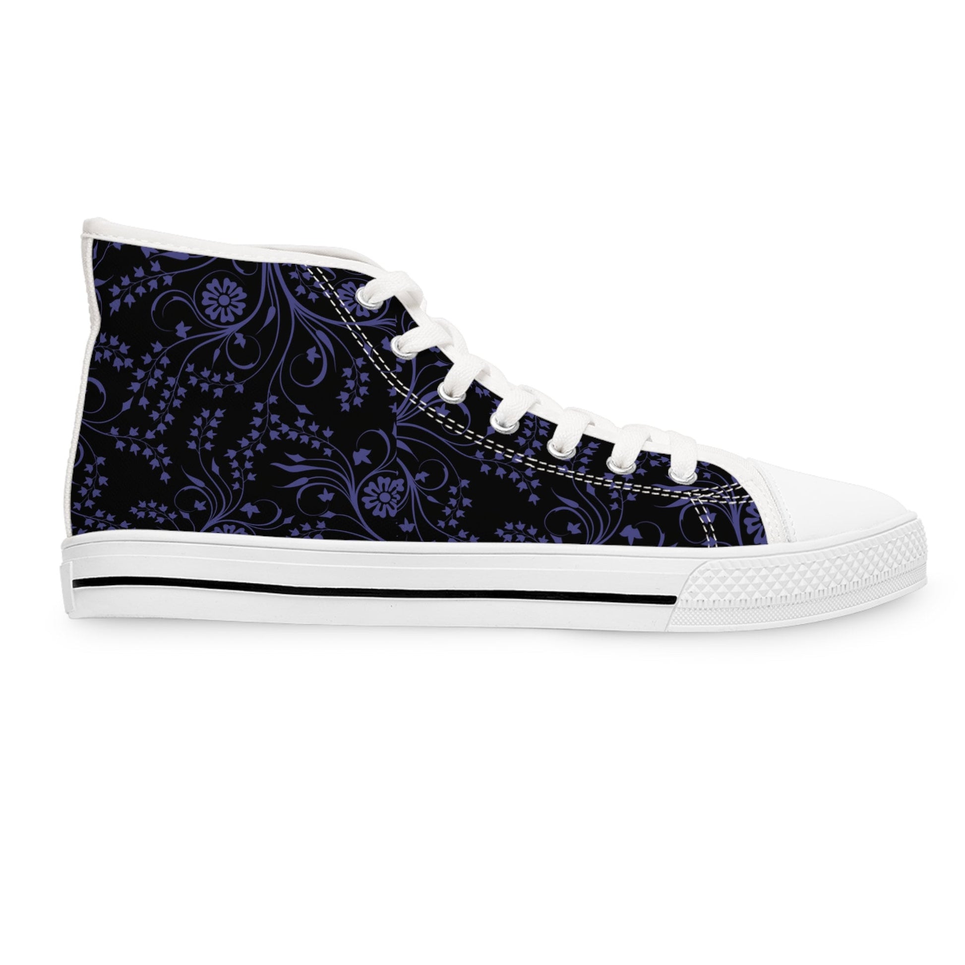 A single high-top sneaker is displayed in a side profile against a white background. The shoe features a black canvas upper with a delicate purple floral and paisley pattern. It has white laces, a white rubber toe cap, and a white sole with a thin black stripe, creating a stylish and elegant contrast.