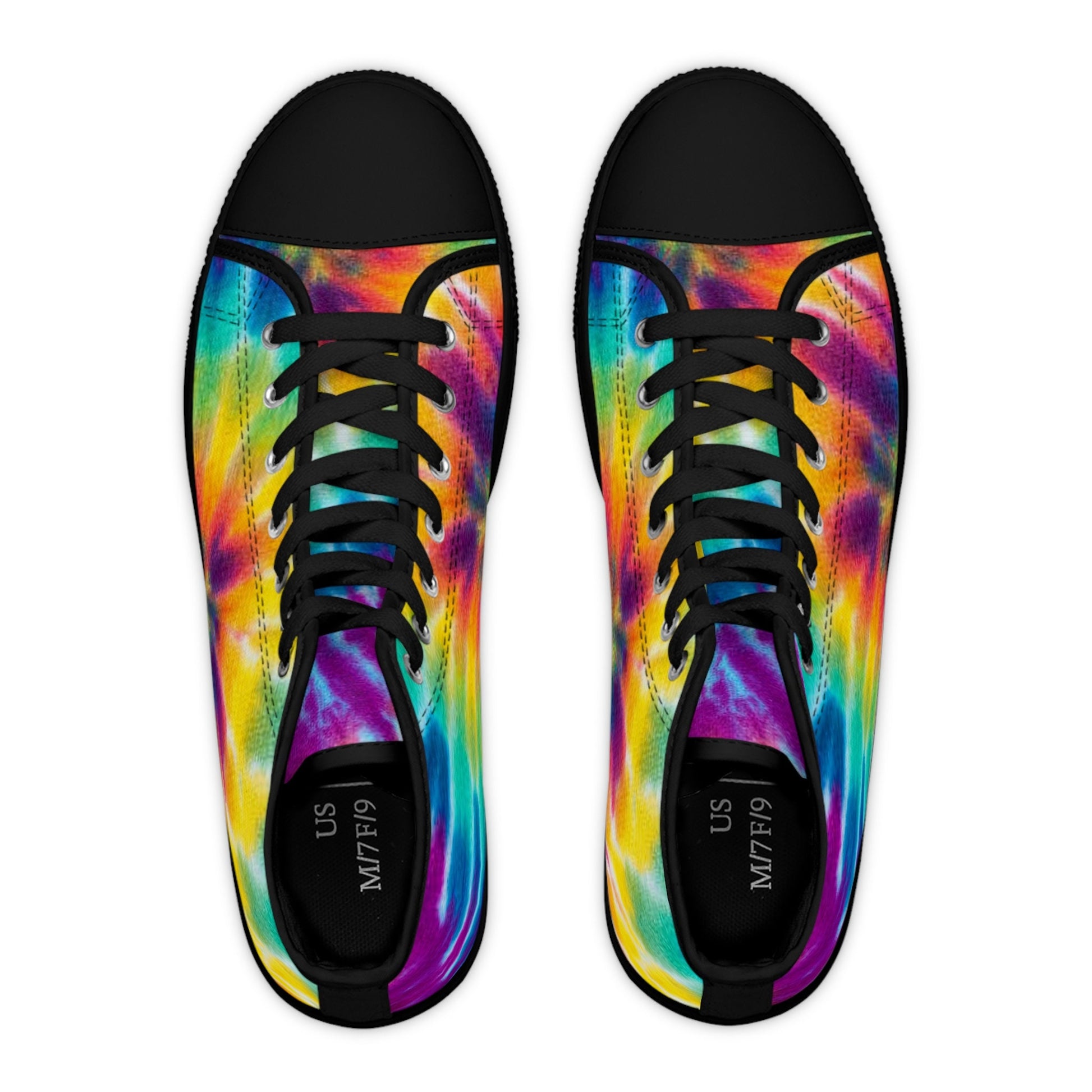 Top view of a pair of high-top sneakers featuring a vivid rainbow tie-dye pattern in shades of red, orange, yellow, green, blue, and purple. The shoes have black laces, black rubber toe caps, and black interior lining. Printed sizing inside reads &quot;US M7/F9.&quot; The bold, multicolor design creates a fun and energetic aesthetic.