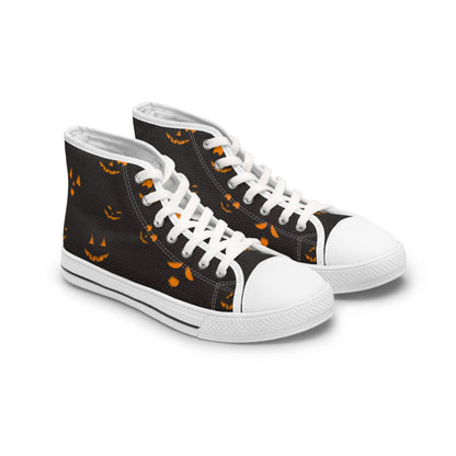 Pair of black high-top sneakers with white soles, laces, and toe caps, featuring a festive Halloween pattern of glowing orange jack-o&#39;-lantern faces. The shoes are displayed against a plain white background.