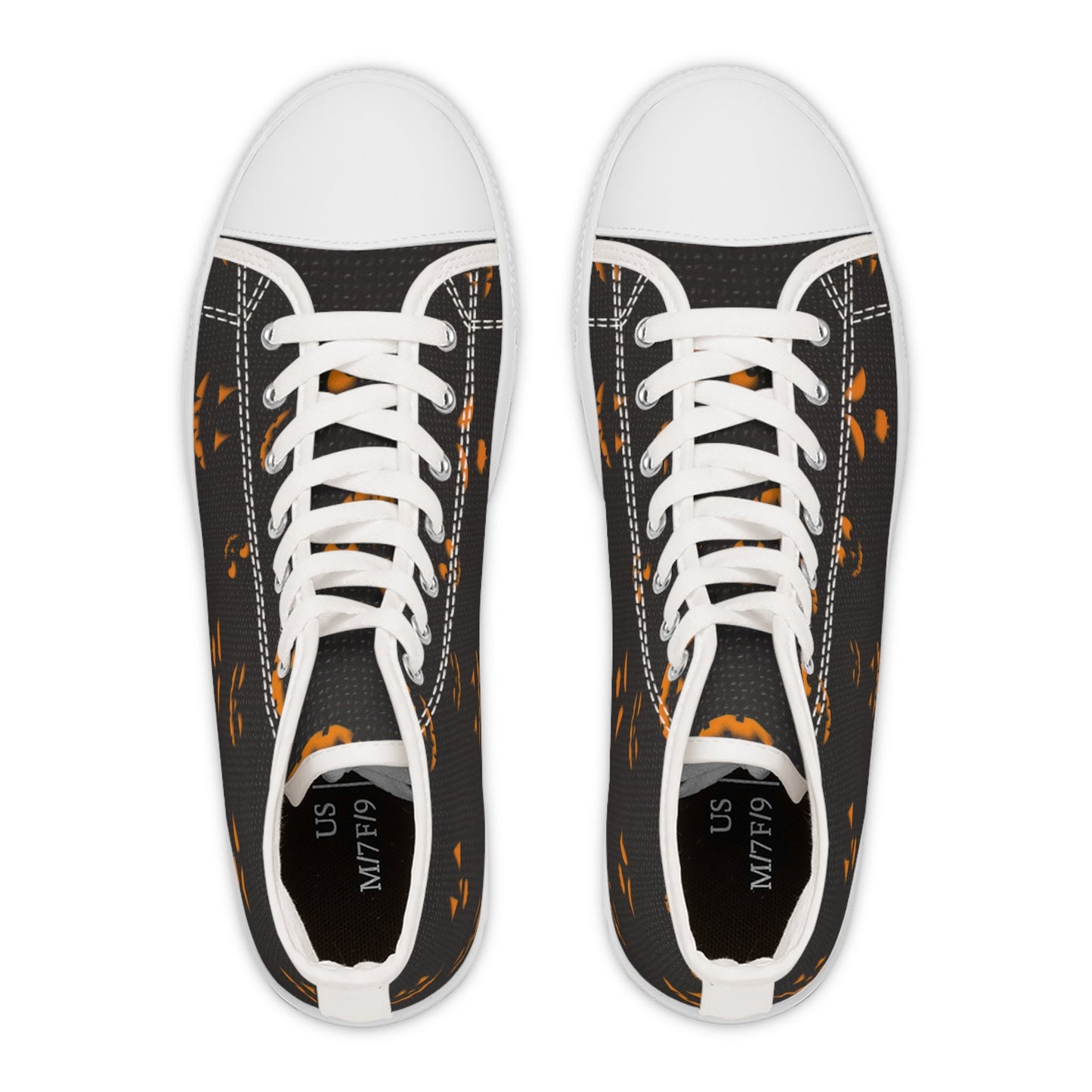 Top-down view of a pair of black high-top sneakers with white toe caps, laces, and soles. The shoes feature a festive Halloween pattern of glowing orange jack-o&#39;-lantern faces and have size labels inside indicating US M7/F9. Displayed on a plain white background.