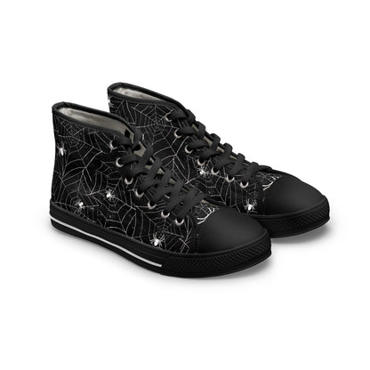 Pair of black high-top sneakers featuring a white spiderweb and spider pattern. The shoes have black soles, black toe caps, black laces, and silver eyelets, creating a bold Halloween-inspired design.
