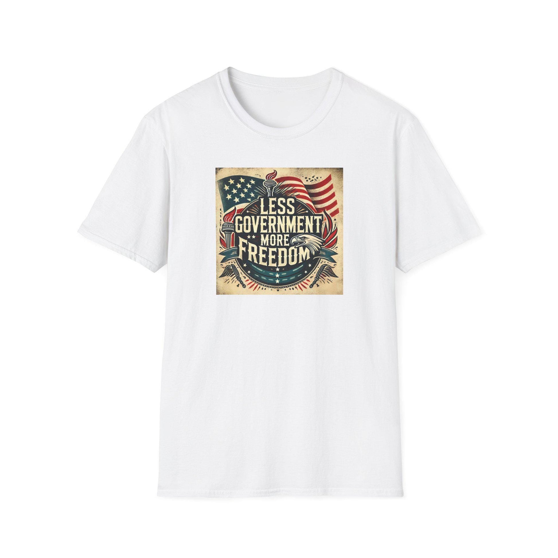 White patriotic t-shirt with vintage-style &#39;Less Government More Freedom&#39; graphic featuring American flag, Statue of Liberty torch, and bald eagle — ideal for Independence Day and liberty-themed apparel.