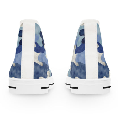 Rear view of a pair of high-top sneakers with a blue camouflage pattern featuring shades of navy, sky blue, and silver. The shoes have white heel tabs running vertically down the back and thick white rubber soles with black horizontal accents near the base. The background is plain white.