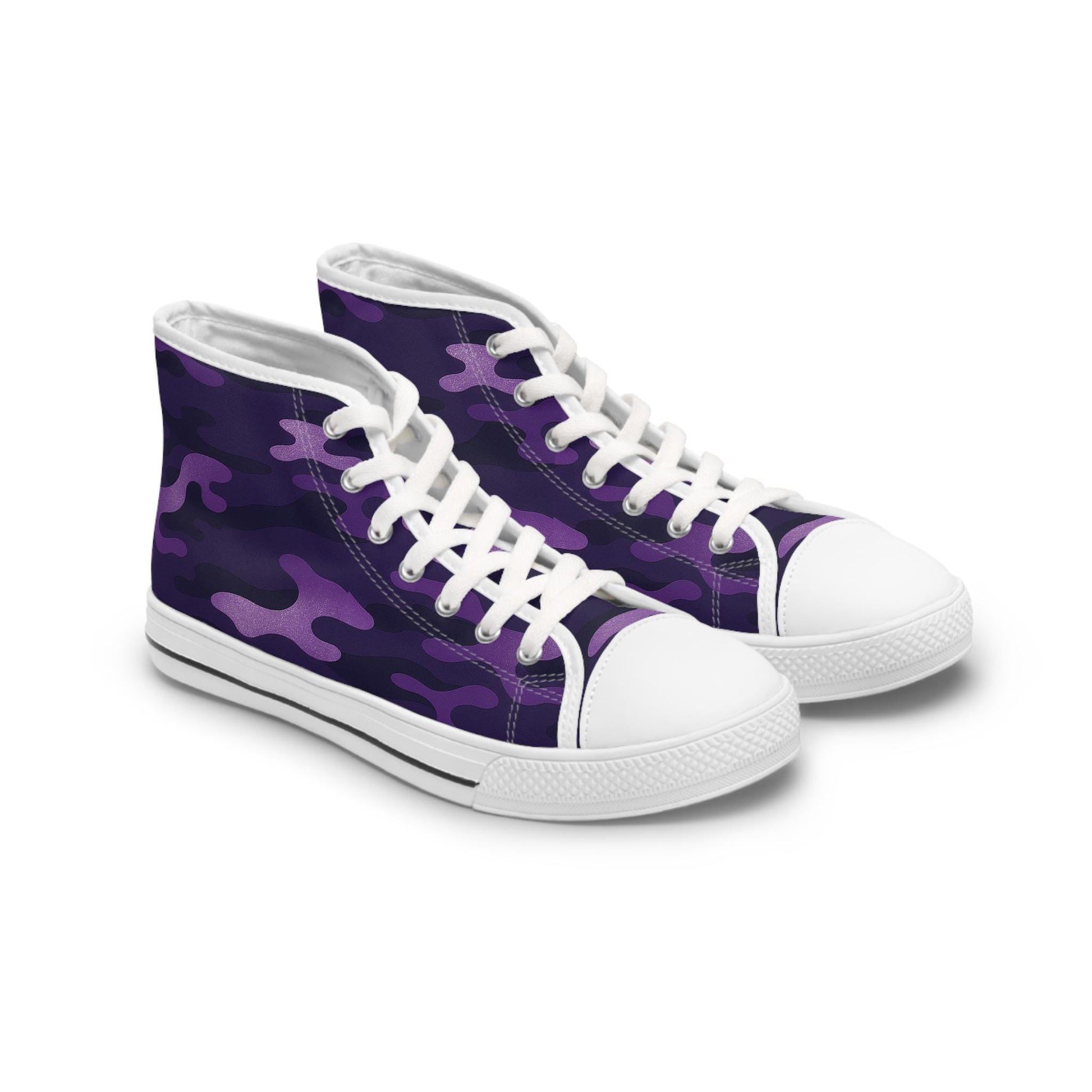 A pair of high-top canvas sneakers featuring a bold purple camouflage pattern. The shoes have white rubber toe caps, white soles with a black stripe, and white laces threaded through metal eyelets. The design combines a classic sneaker silhouette with a modern, eye-catching print.