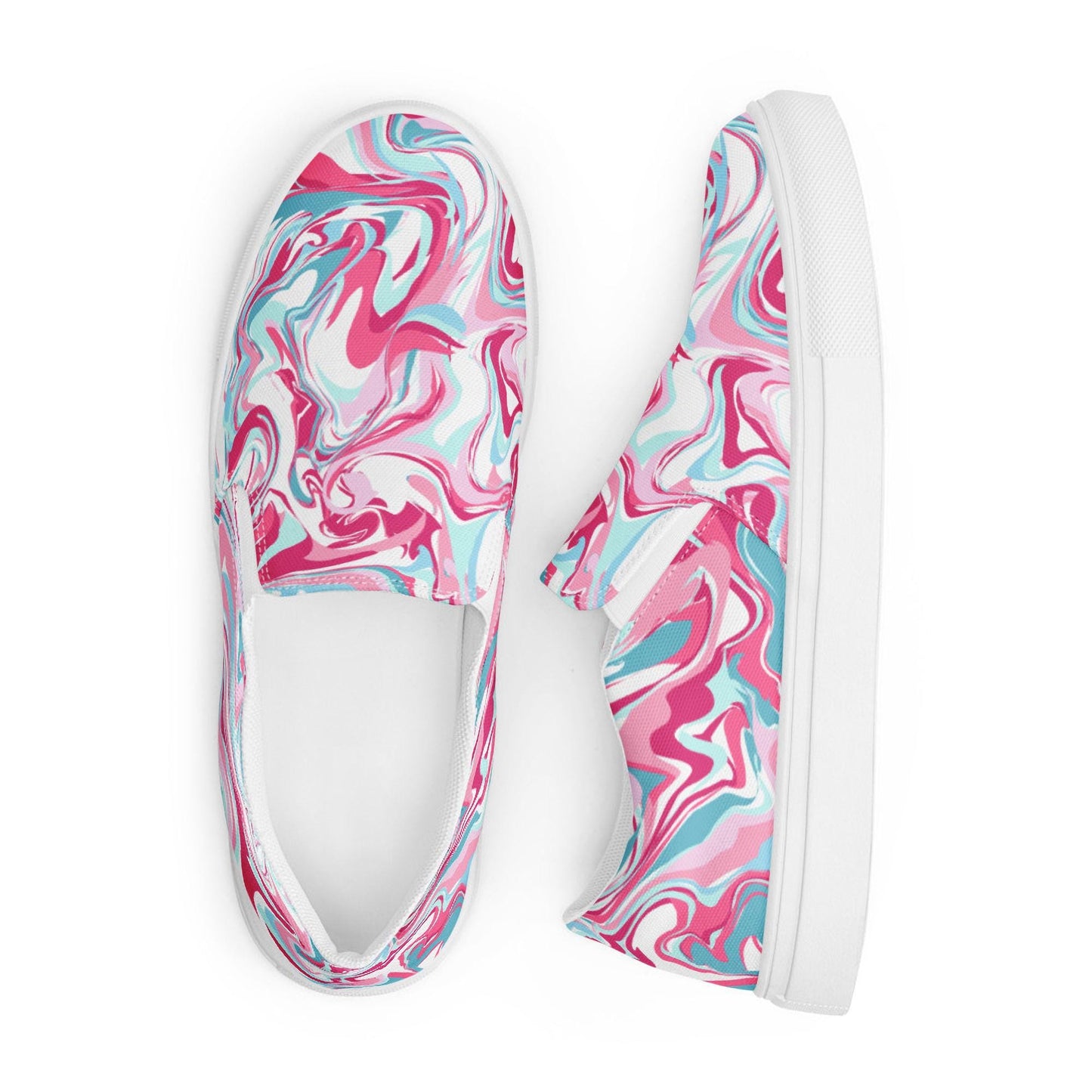 A pair of slip-on canvas sneakers displayed from a top-down view on a white background. The shoes feature a bold marbled swirl pattern in vibrant shades of pink, turquoise, and white, with white elastic side panels and white rubber soles. One shoe is positioned upright while the other lies flat, showcasing both the top and side design.
