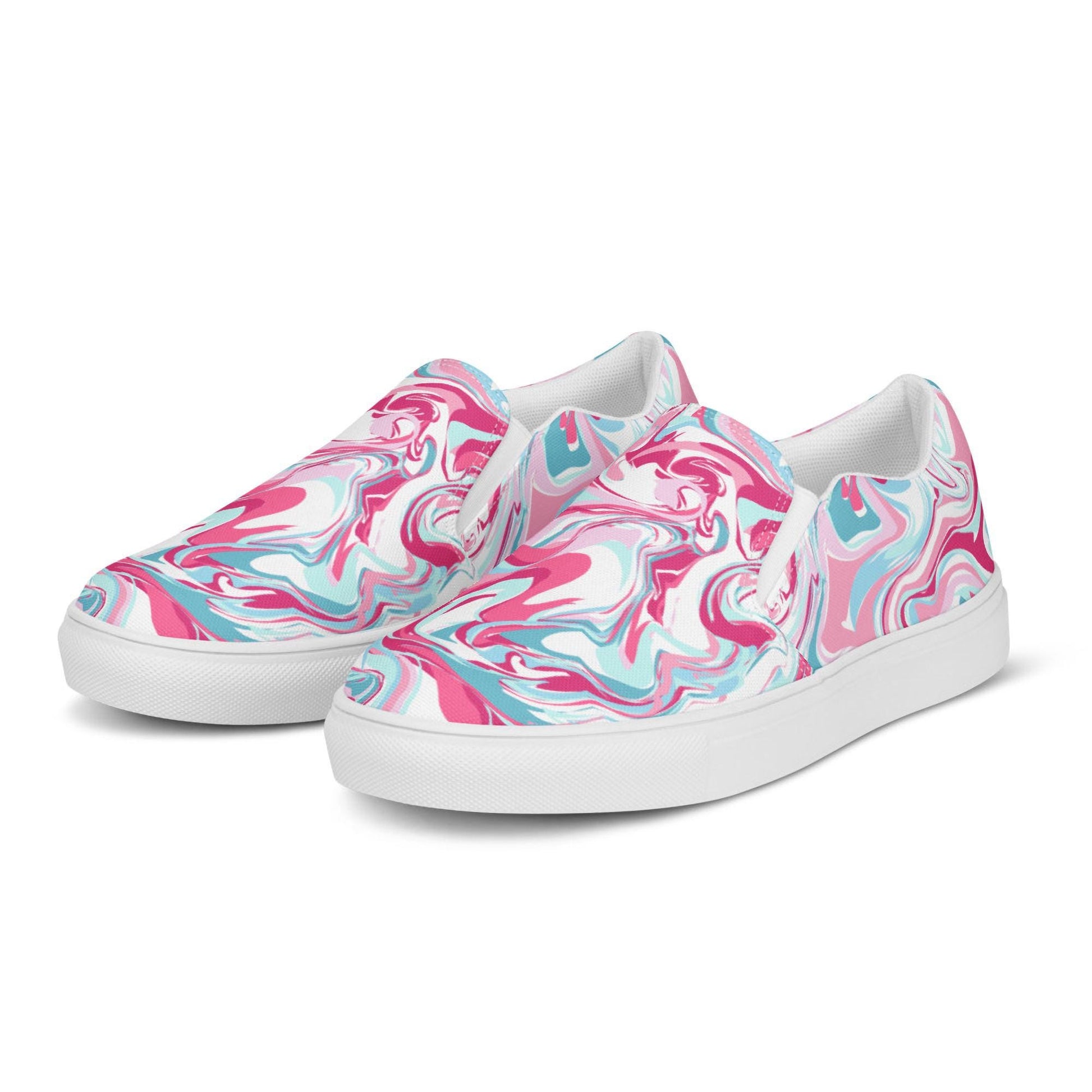 A pair of slip-on sneakers with a bold marbled swirl design in pink, teal, and white. The shoes have white elastic side panels and white rubber soles, and are displayed on a clean white background at a slight angle to showcase both the front and side views.