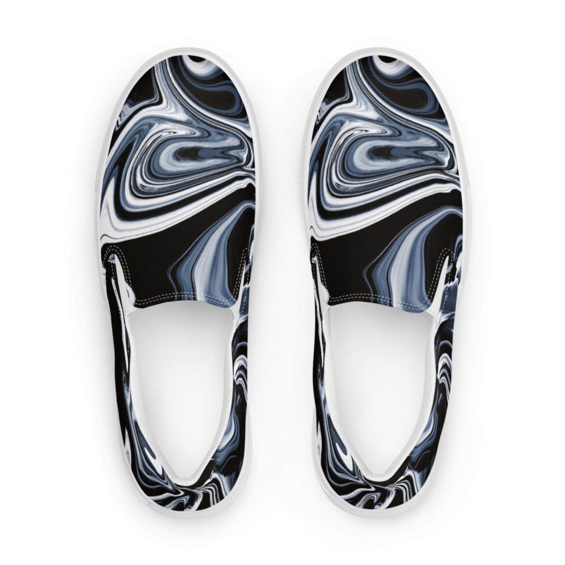Top-down view of women&#39;s slip-on canvas shoes featuring a bold black, white, and gray marbled swirl pattern. Stylish and artistic footwear with a modern abstract design, perfect for casual everyday outfits