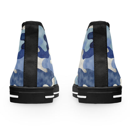 Rear view of a pair of high-top sneakers with a blue camouflage pattern in shades of navy, sky blue, and silver. The shoes feature black heel tabs and black rubber soles with white accent stripes near the base. The background is clean and white.