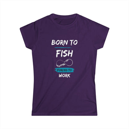 Purple women&#39;s t-shirt featuring a fun graphic with the phrase &quot;Born to Fish, Forced to Work&quot; in white and turquoise text, accented with a simple fishing hook illustration.