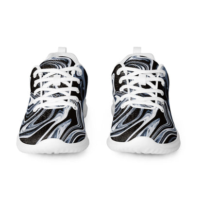 Front view of women&#39;s athletic sneakers featuring a bold black, white, and gray marble swirl design with white laces and thick white soles. Trendy and eye-catching running shoes perfect for casual wear, gym workouts, or active lifestyles with a modern artistic flair.