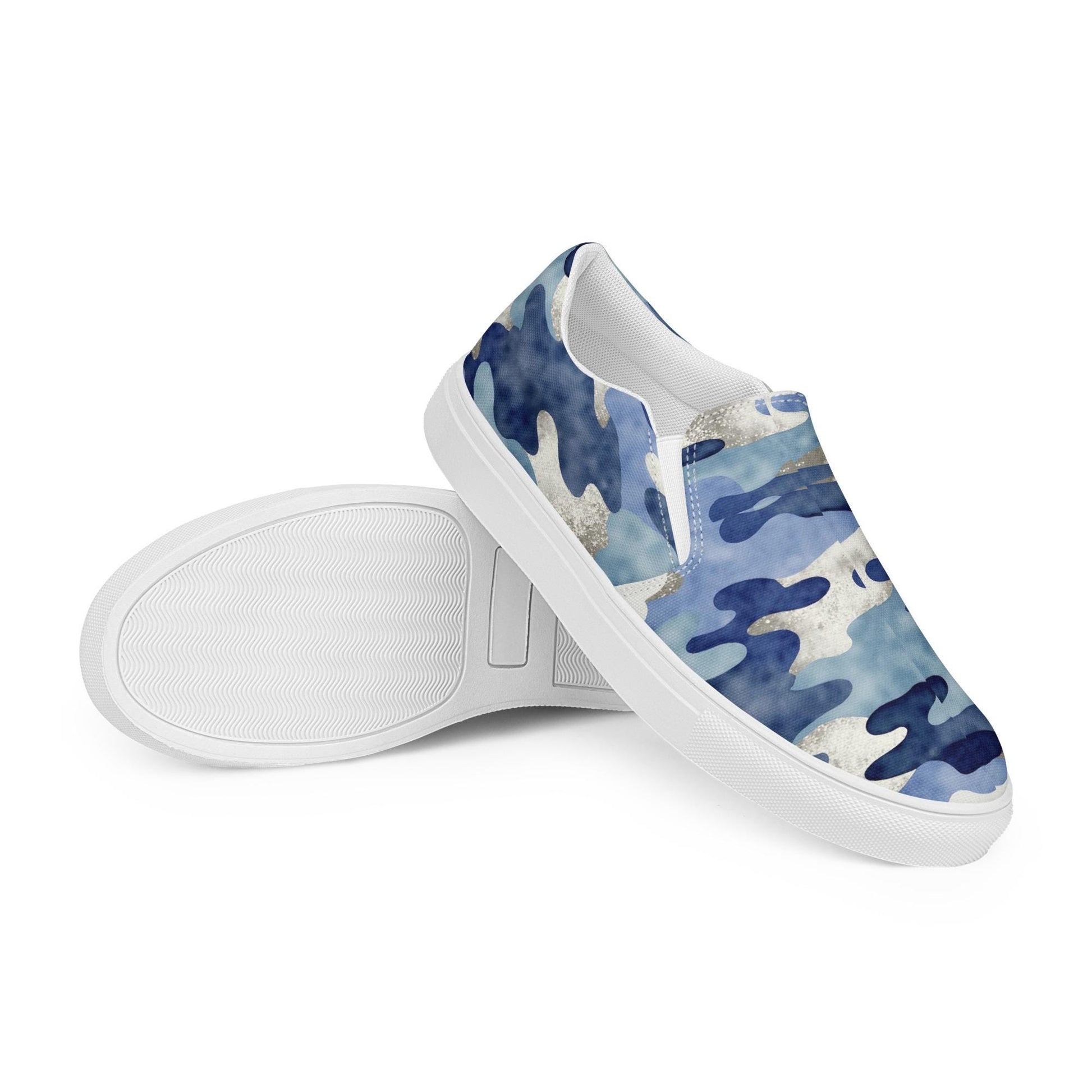 Women’s slip-on canvas sneakers with blue camo design and white rubber soles, shown with sole and side view for casual everyday wear