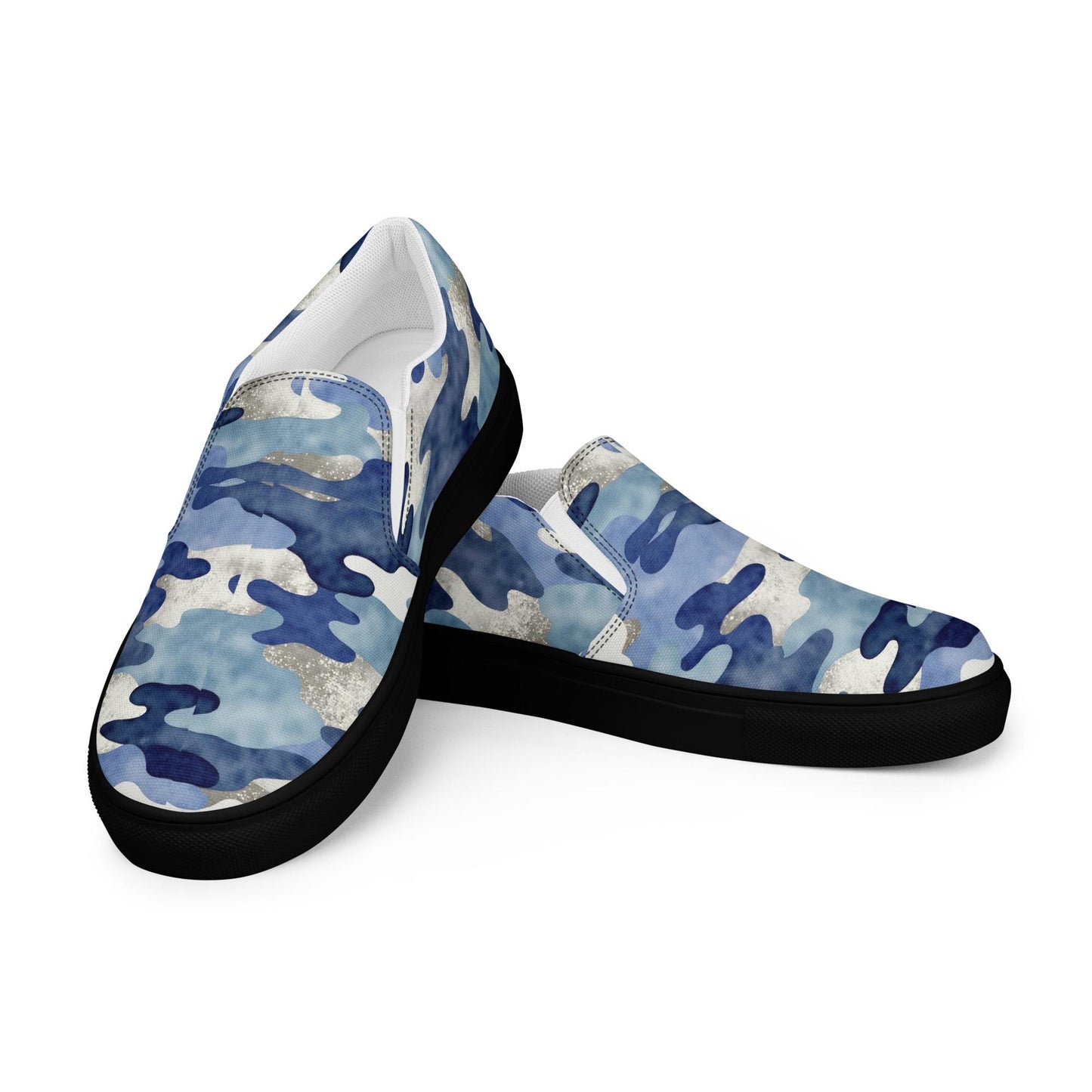 Women’s blue camo slip-on canvas shoes with black soles, lightweight casual sneakers perfect for everyday wear.