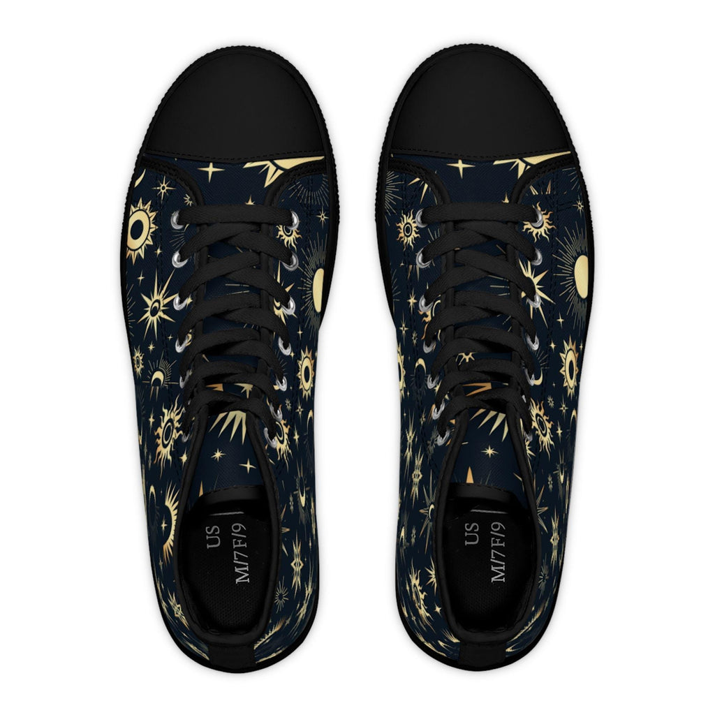 Top-down view of a pair of high-top sneakers with a celestial design featuring golden suns, moons, and stars on a dark navy background. The shoes have black laces, black rubber toe caps, and black insoles labeled “US M7/F9.” The design is symmetrical and bold, blending cosmic elegance with a modern, edgy style.