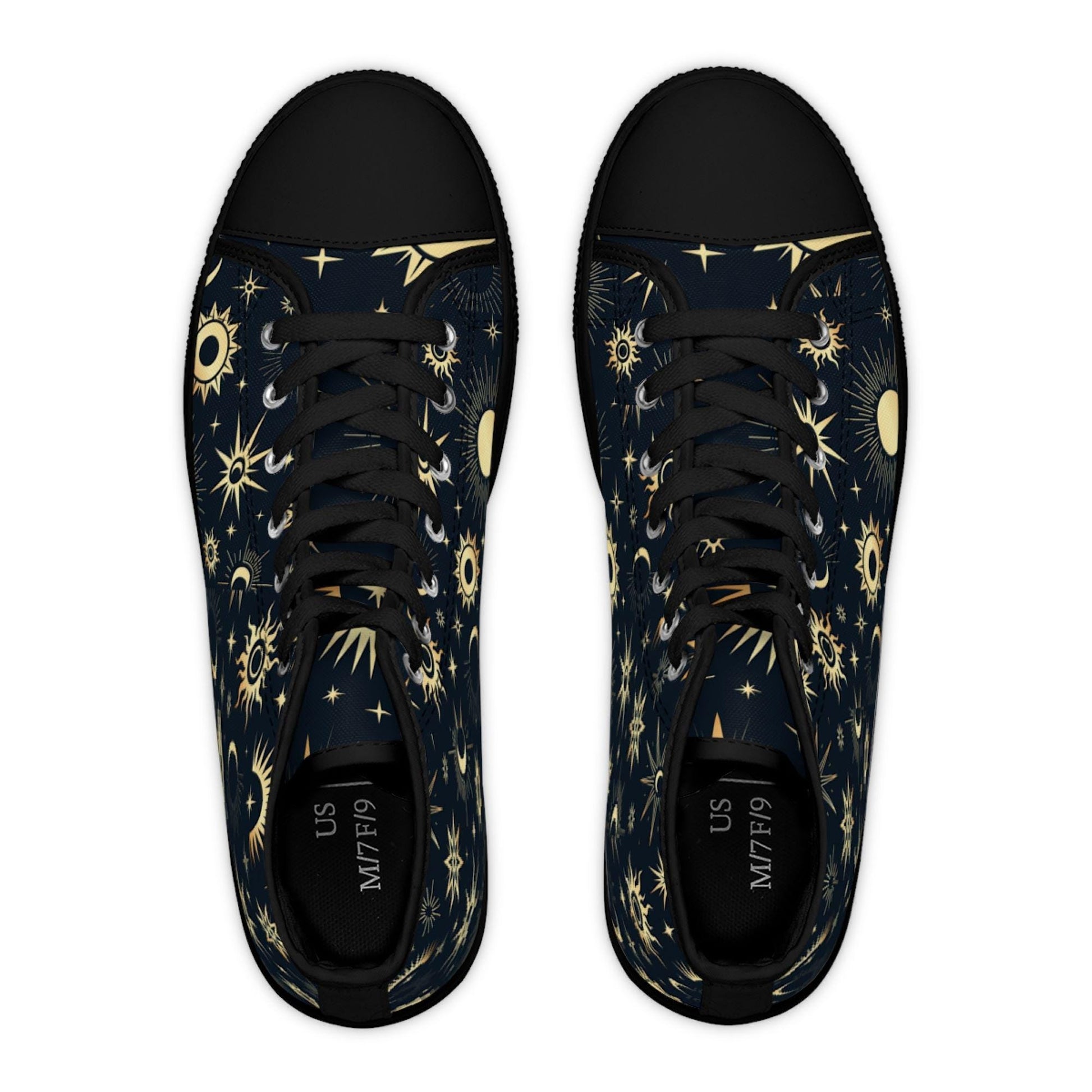 Top-down view of a pair of high-top sneakers with a celestial design featuring golden suns, moons, and stars on a dark navy background. The shoes have black laces, black rubber toe caps, and black insoles labeled “US M7/F9.” The design is symmetrical and bold, blending cosmic elegance with a modern, edgy style.