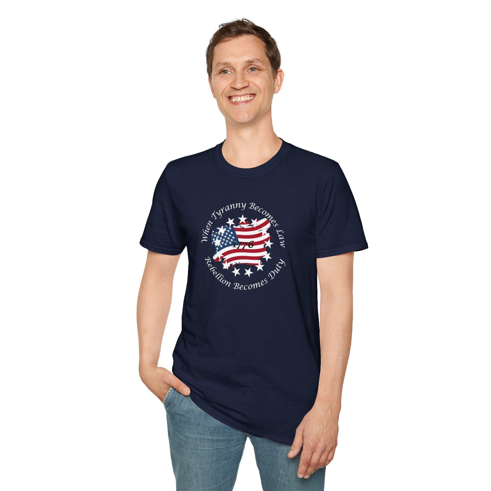 Man wearing a navy blue patriotic t-shirt with a distressed American flag design and the quote &quot;When Tyranny Becomes Law, Rebellion Becomes Duty&quot;—comfortable and bold statement tee for freedom lovers and patriotic events.
