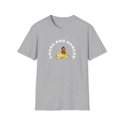 Etsy SEO Writer said:

Gray unisex t-shirt featuring a playful design with a cartoon hen sitting on a nest of eggs. Above the illustration, bold white text reads “LOCAL EGG DEALER” in a curved arch. The shirt is laid flat on a white background, showcasing the graphic and classic crew neck style.
