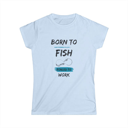 Light blue women&#39;s t-shirt with a playful fishing-themed design that reads &quot;Born to Fish, Forced to Work&quot; in bold black and blue text, featuring a simple graphic of a fishing hook