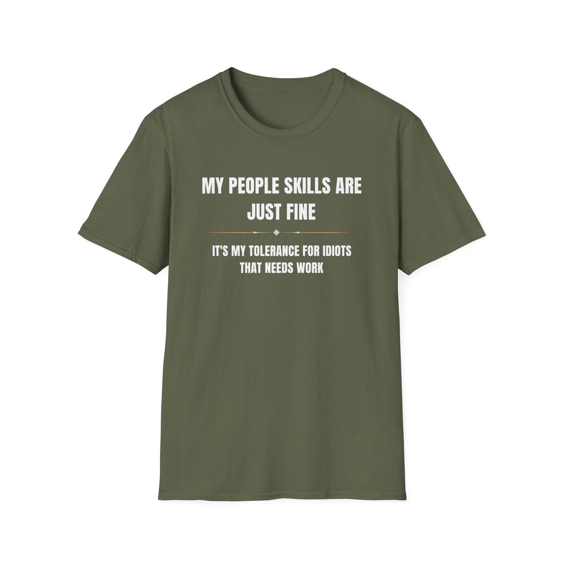 Military green unisex T-shirt laid flat on a white background, featuring bold white and gold typography that reads: “MY PEOPLE SKILLS ARE JUST FINE — IT’S MY TOLERANCE FOR IDIOTS THAT NEEDS WORK,” with a thin gold line and diamond accents separating the phrases.